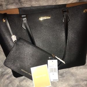 Michael kors purse and hand bag.